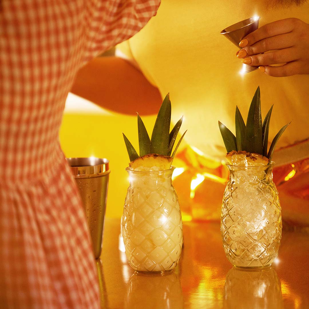 Two Malibu coconut and pineapple drinks