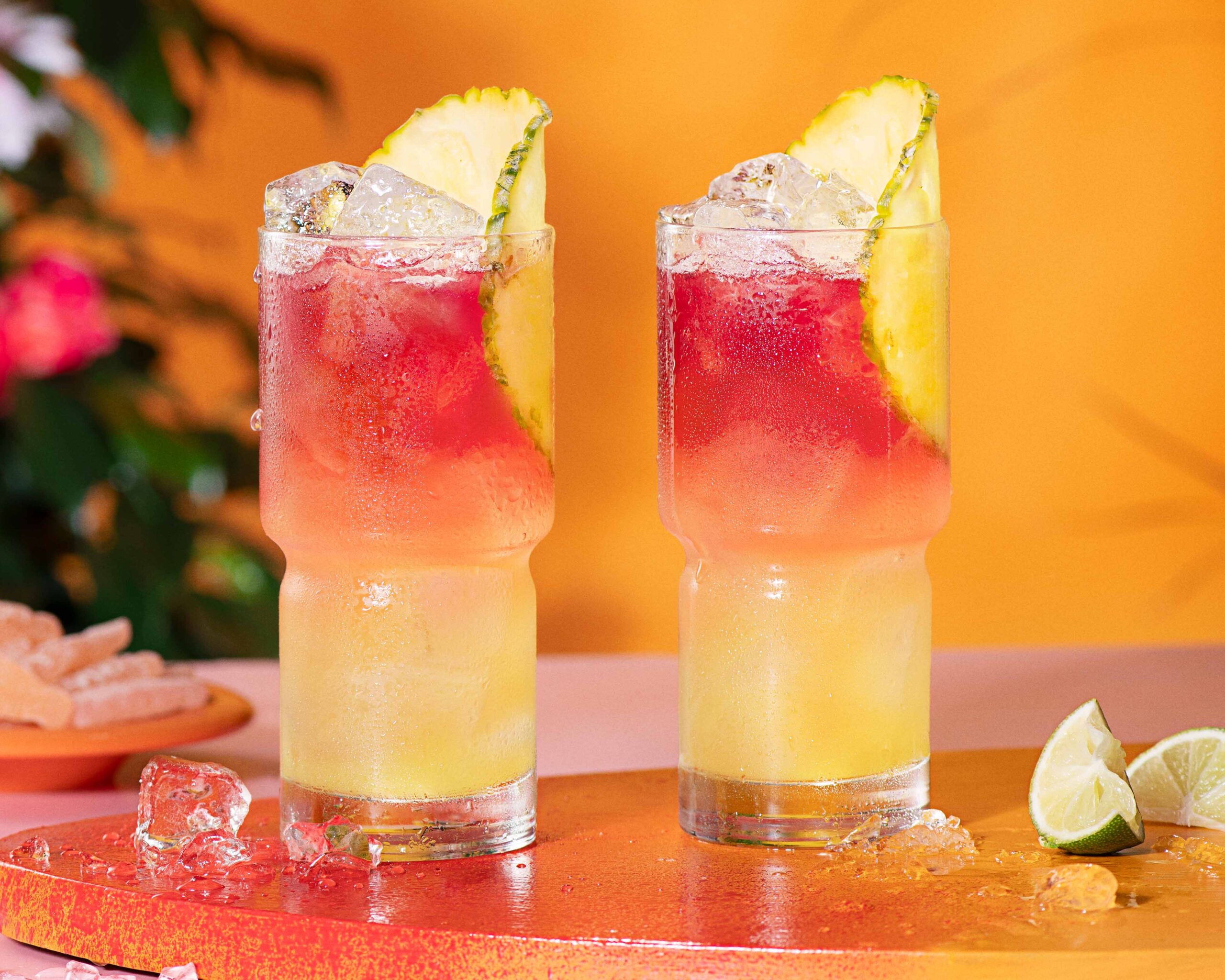 Two Malibu Bay Breezes against an orange indoor setting